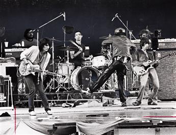 (ROLLING STONES) A collection of 12 images showing the Rolling Stones performing to a crowd of over 70,000 fans at Soldier Field, Chica